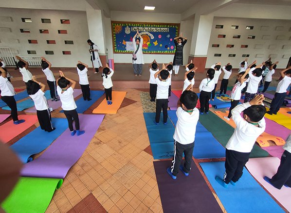 Delhi Public School Electronic City Celebrates 9th International Yoga Day with Great Enthusiasm